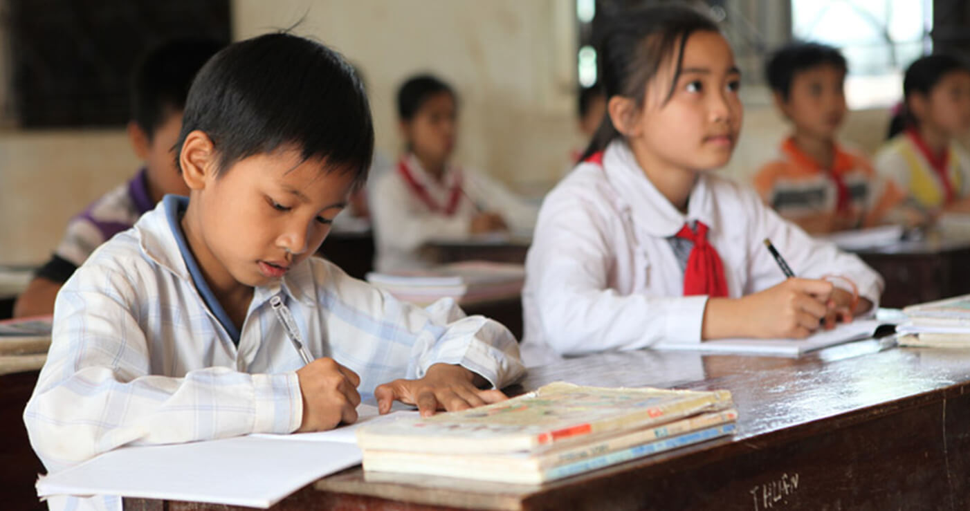 primary-school-in-vietnam-children-at-their-desk_1402x739 Children at a desk